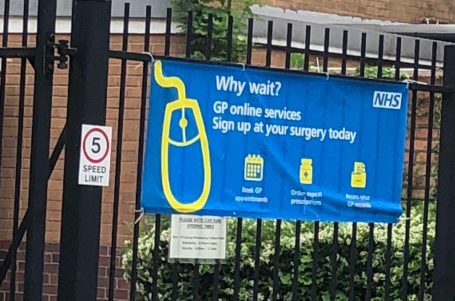 GP onlie services banner on outside railings